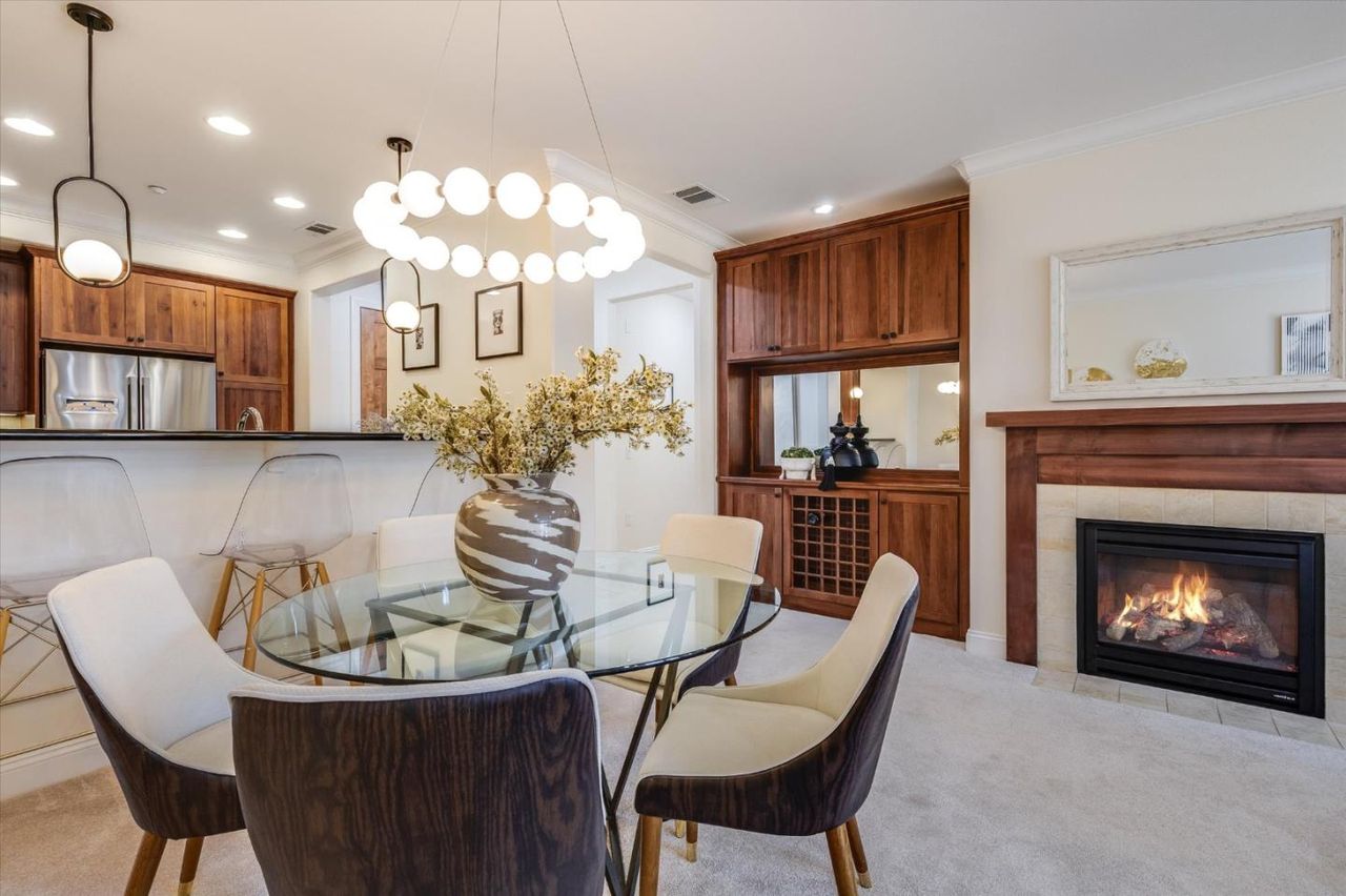 Dining with a view of the fireplace at 2881 Meridian Ave Unit 249
