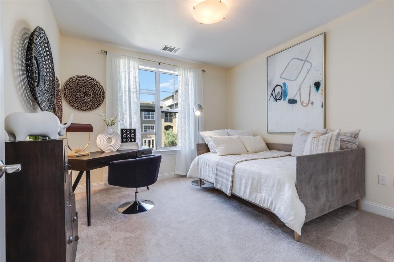 Second bedroom with a desk and daybed at 2881 Meridian Ave Unit 249