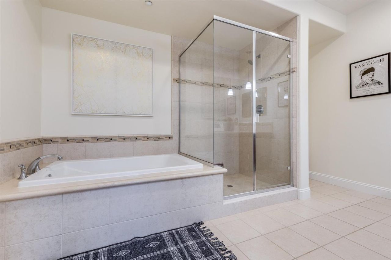 Soaking tub and glass shower at 2881 Meridian Ave Unit 249