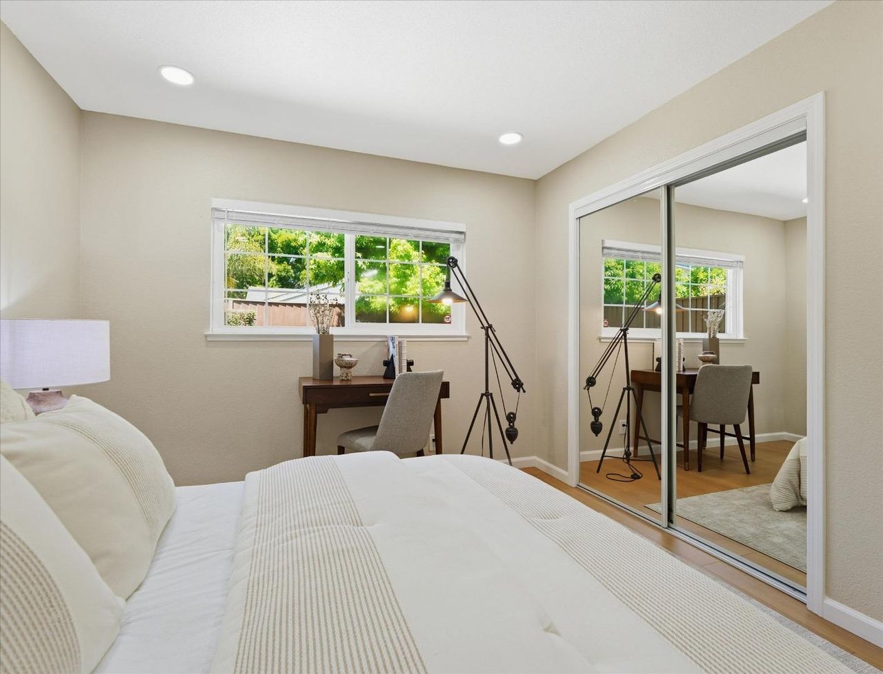 Bedroom with a desk under the windows at 4999 Massachusetts Dr