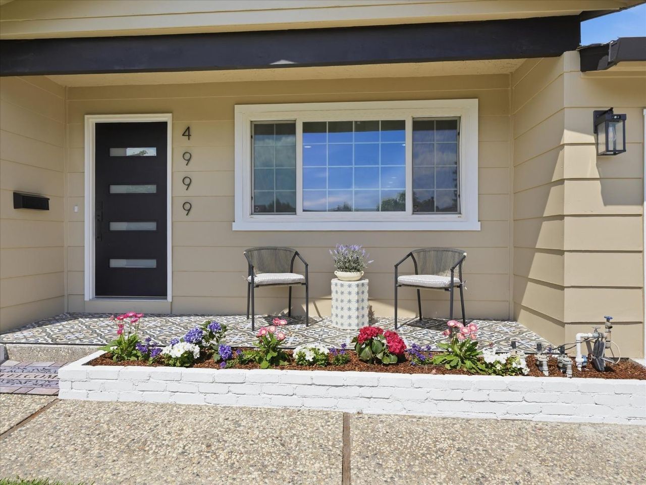 Tiled front patio at 4999 Massachusetts Dr