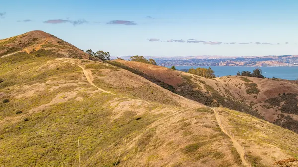 Hiking trail on golden hills above the bay near Los Altos